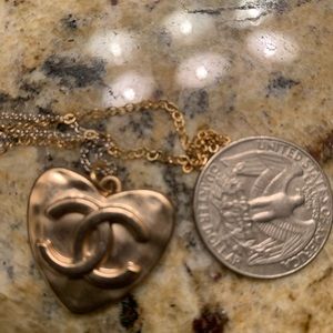 Chanel large heart charm on a 17 inch gold chain